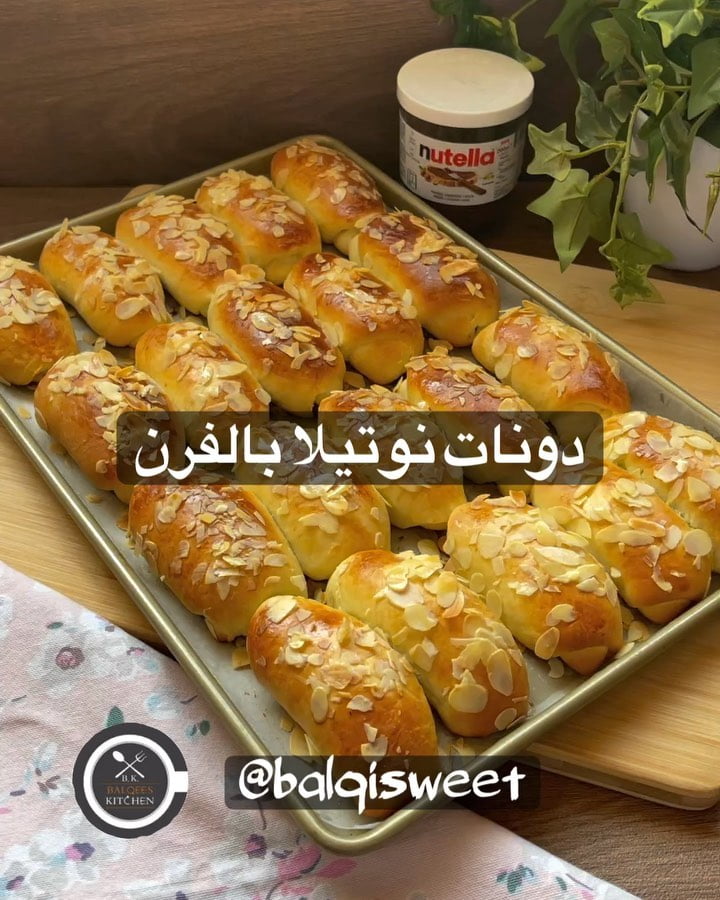 دونات نوتيلا بالفرن 5 دونات نوتيلا بالفرن
الطريقة
في العجانة الكهربائيه :
اضع كوب وثلث حليب دافي +ربع