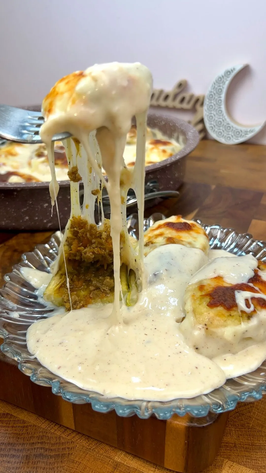 قوارب الكوسا والبطاطا بالبشاميل